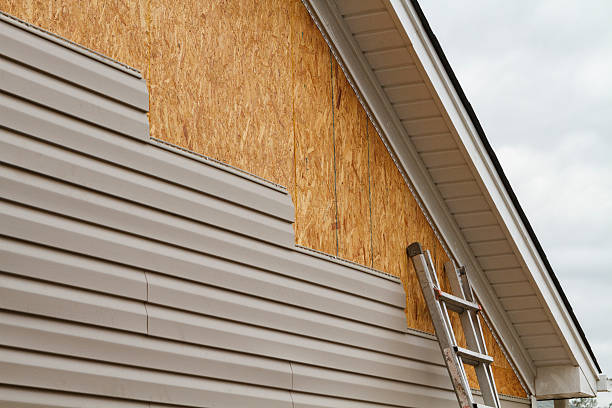 Professional Emergency Siding Repair technician working in Farmersville, OH